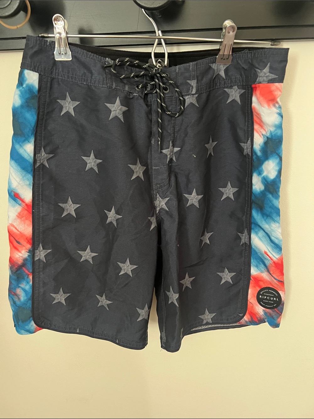Rip Curl Men’s Navy Star Swim Shorts with Red & Blue Tie-Dye Sides